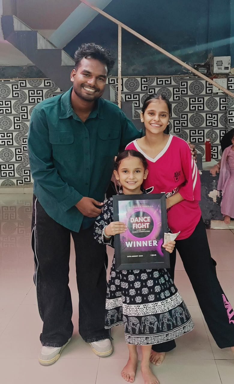 Yoga24Fitness students with their dance competition winner's award