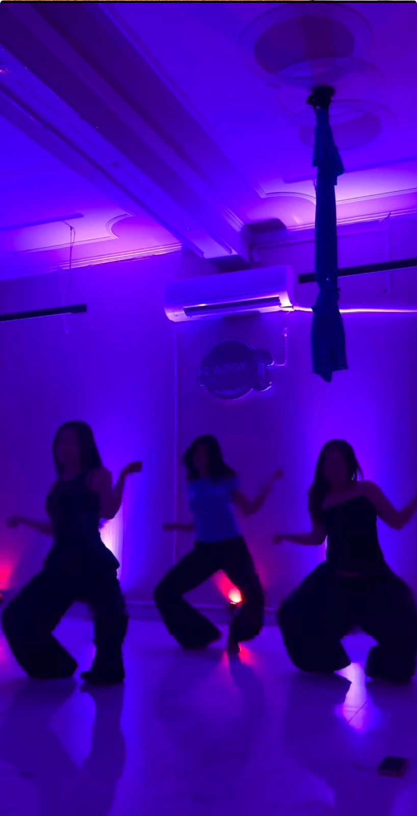 Dance class rehearsing a routine in the Yoga24Fitness studio